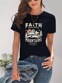 Person wearing a black t-shirt with 'Faith Can Move Mountains' graphic and text.