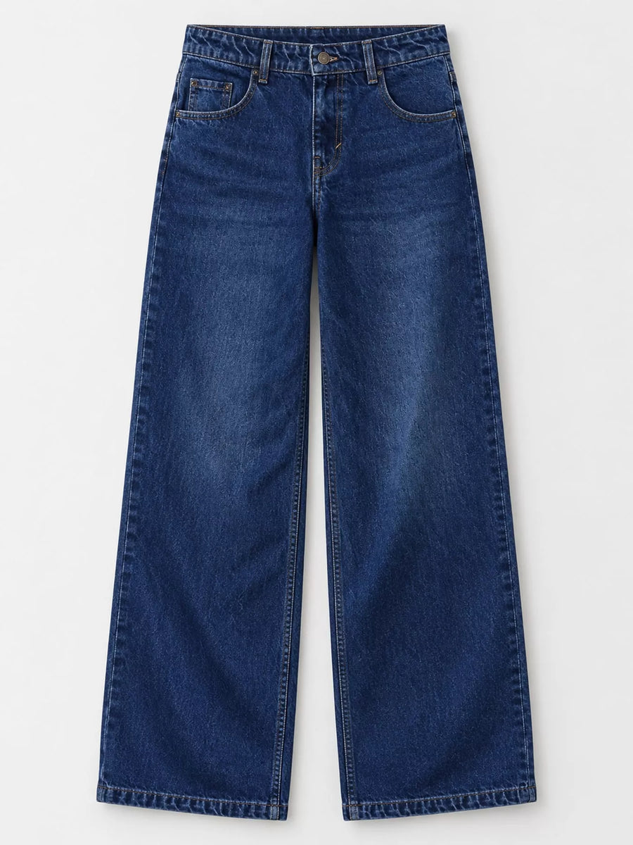 A pair of dark blue wide-leg denim jeans shown flat against a light gray background.
