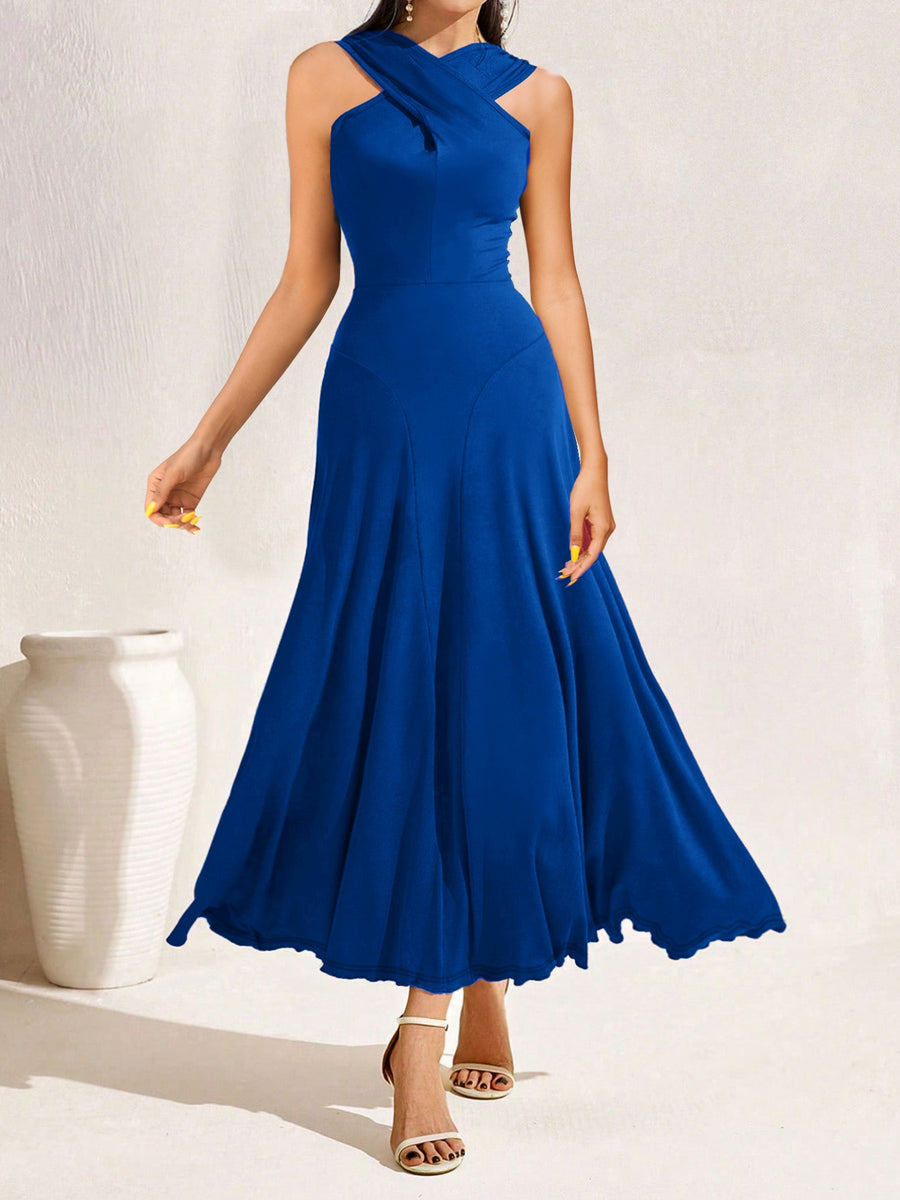 Woman wearing a blue dress against a white background