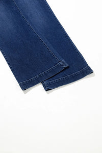 Close-up of blue denim fabric on a white background