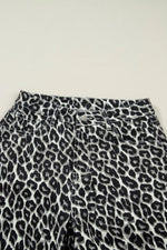 Leopard print pants on a light background