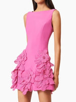 Pink dress with floral details on a white background