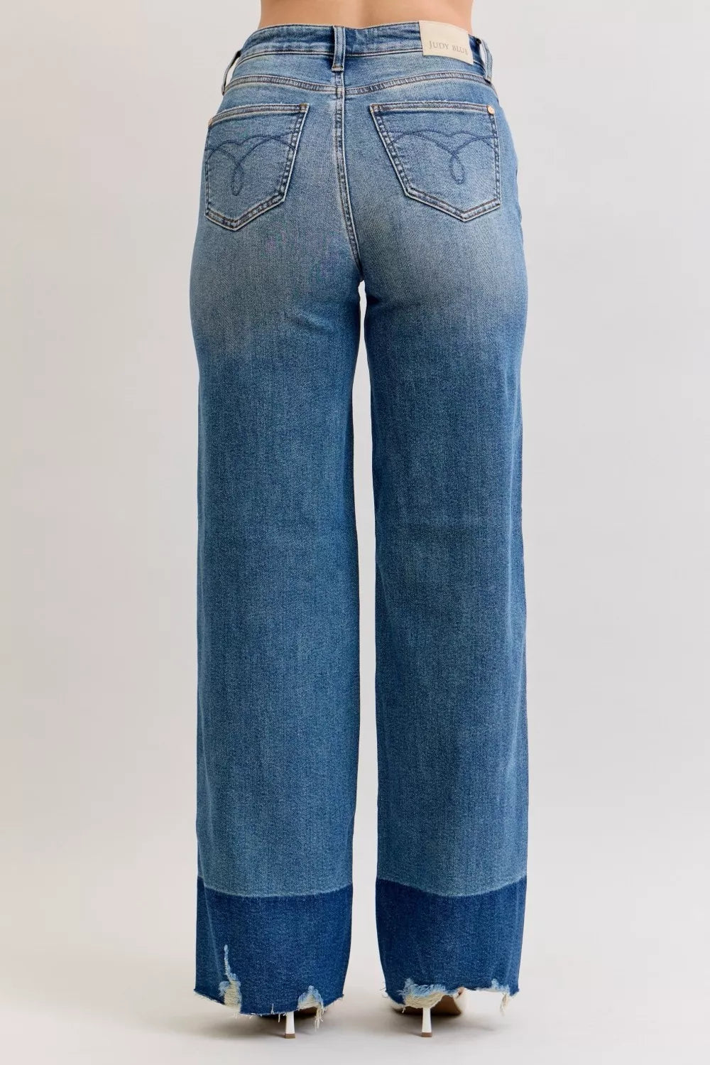 Blue jeans with a white background