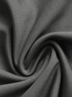 Close-up of dark gray fabric with folds