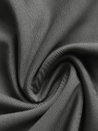 Close-up of dark gray fabric with folds