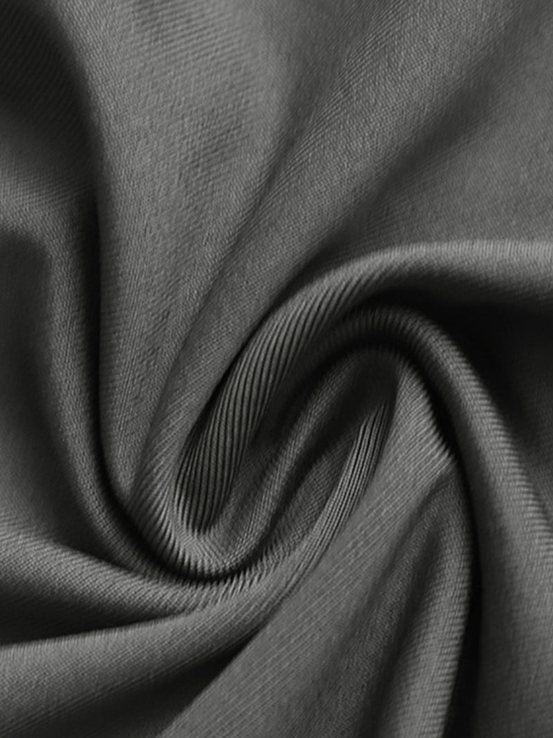 Close-up of dark gray fabric with folds