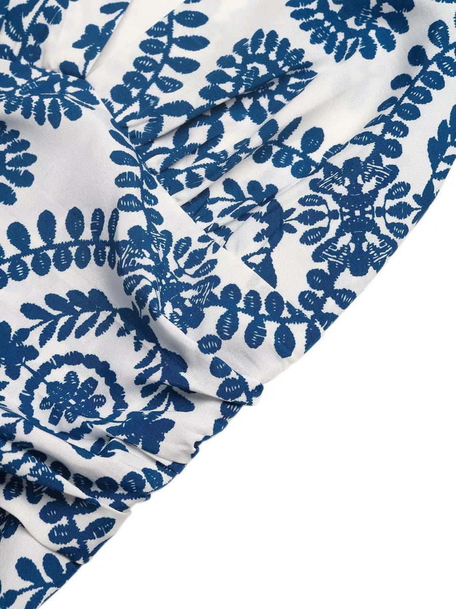 White fabric with blue floral patterns