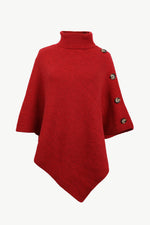 Red poncho with button details on a white background