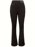 Black flared pants on a white background