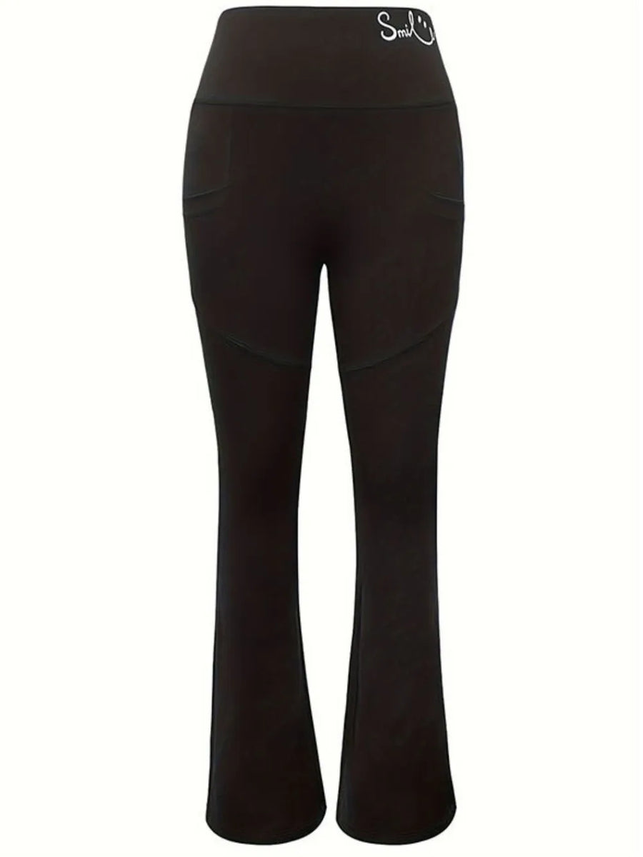 Black flared pants on a white background