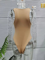Beige bodysuit on a transparent mannequin against a striped background