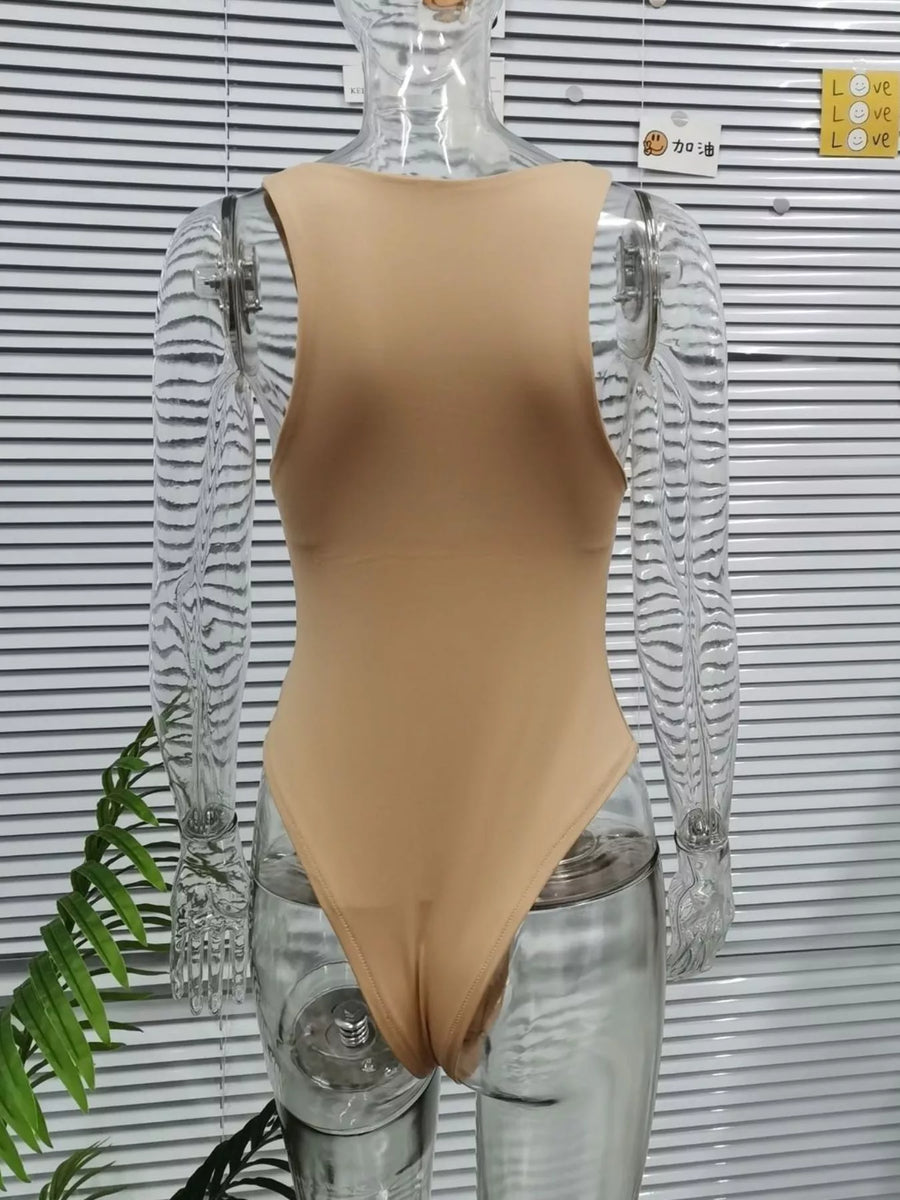 Beige bodysuit on a transparent mannequin against a striped background