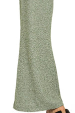 Green textured fabric on a white background