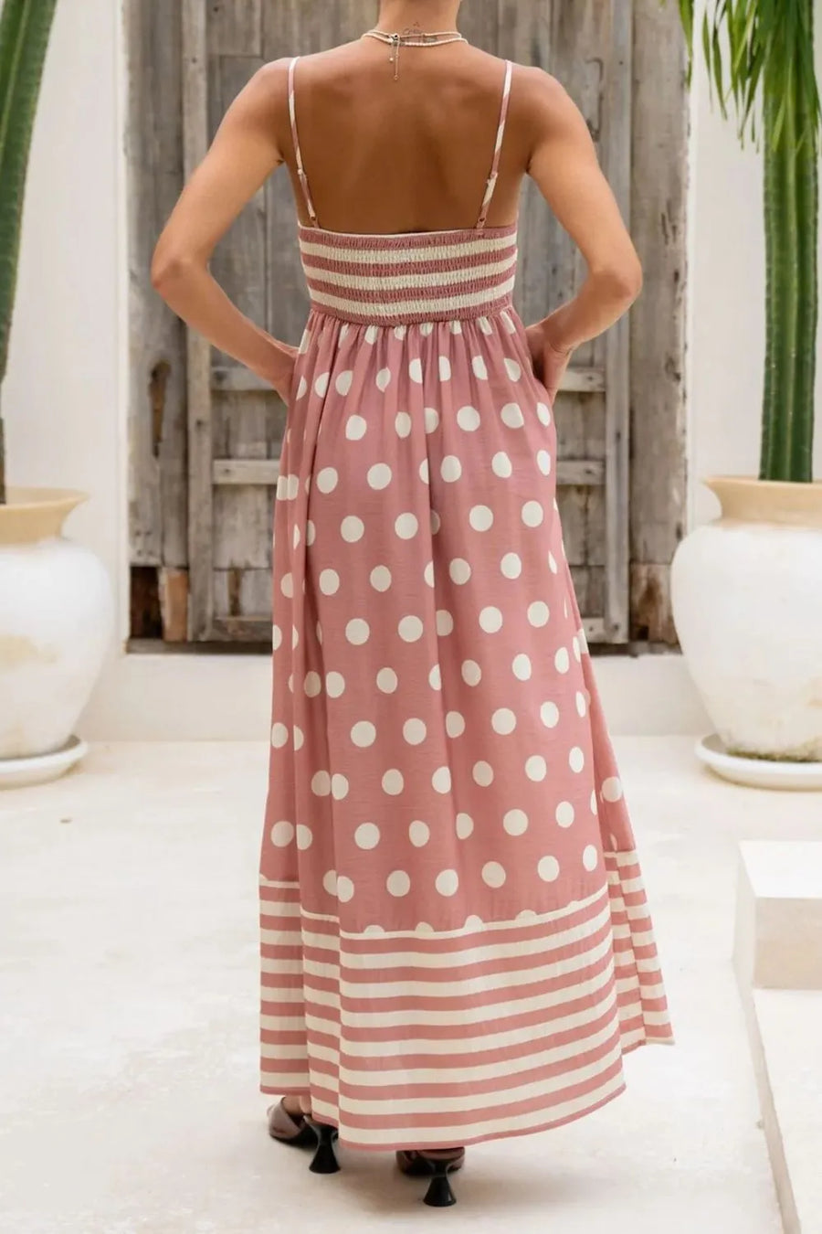 Model showing pockets from the back on Polka Dot Square Neck Cami Dress