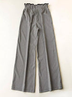 Black and white checkered pants on a white background