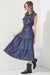 Side view of PLUS SLEEVELESS BUTTON DOWN COLLARED DENIM DRESS