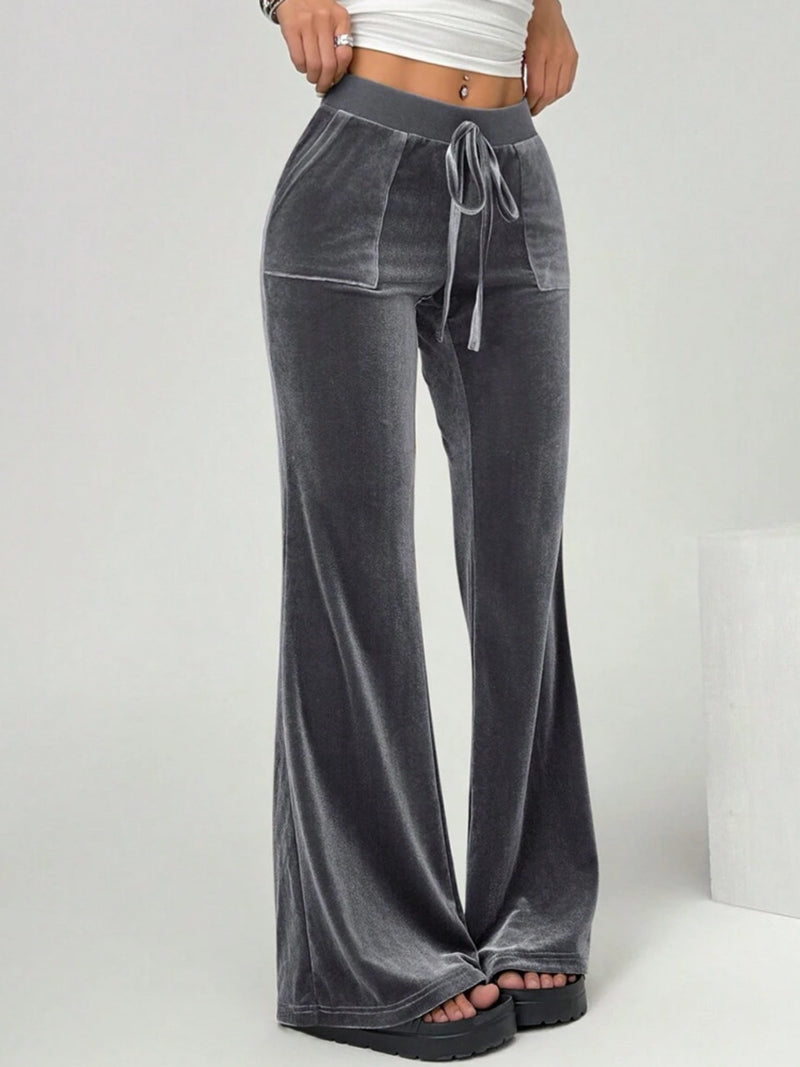 Gray wide-leg pants with a drawstring waist on a white background