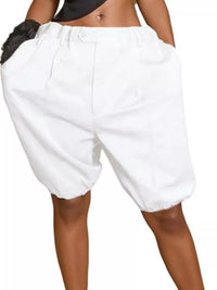 White shorts worn by a person on a white background