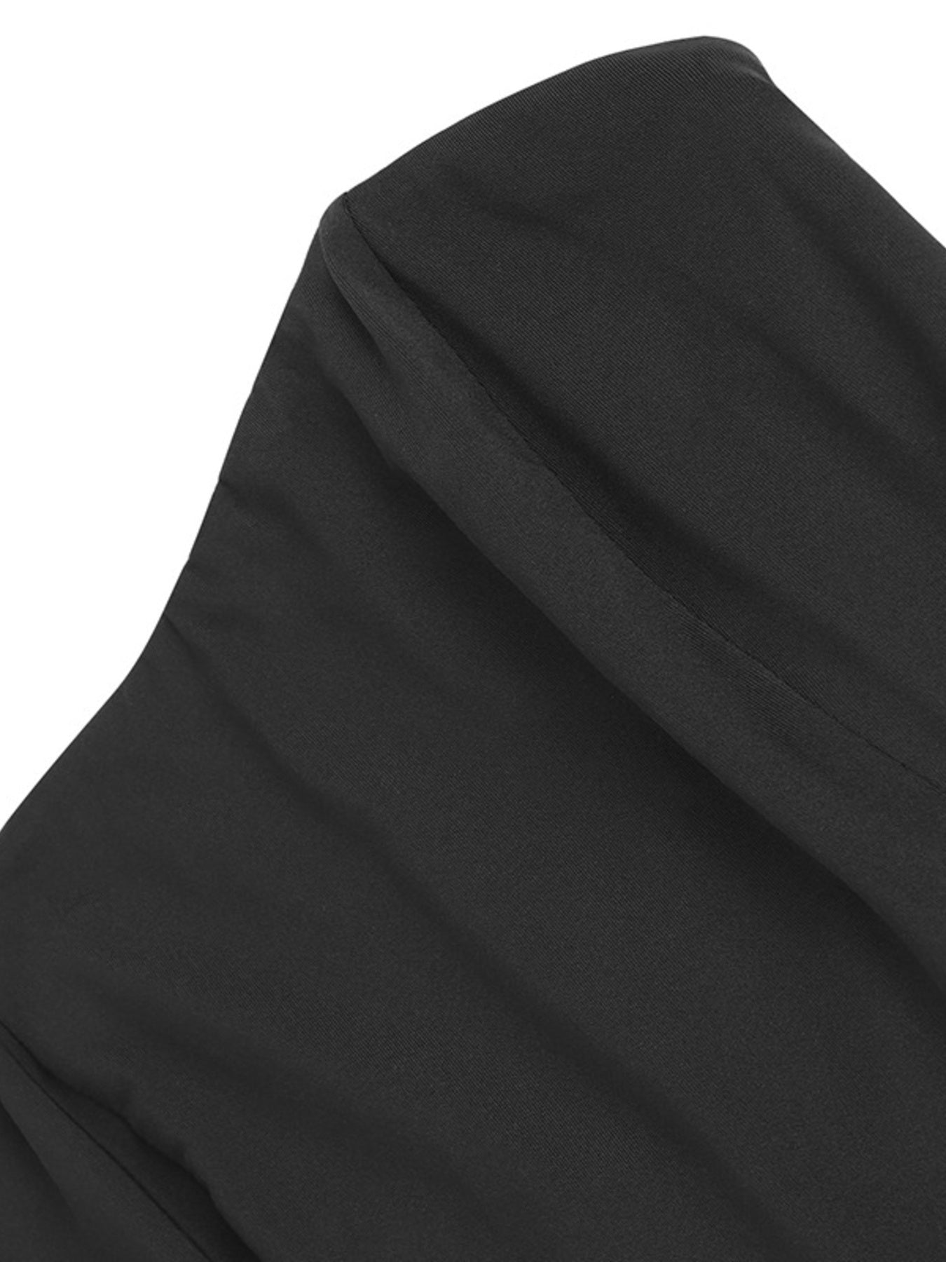 Close-up of a black hijab on a white background