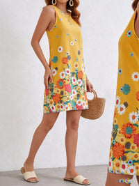 Woman wearing a yellow floral dress holding a straw bag against a white background