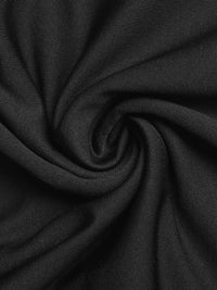 Close-up of black fabric with a swirl pattern