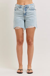 Light blue denim shorts with distressed details on a plain background