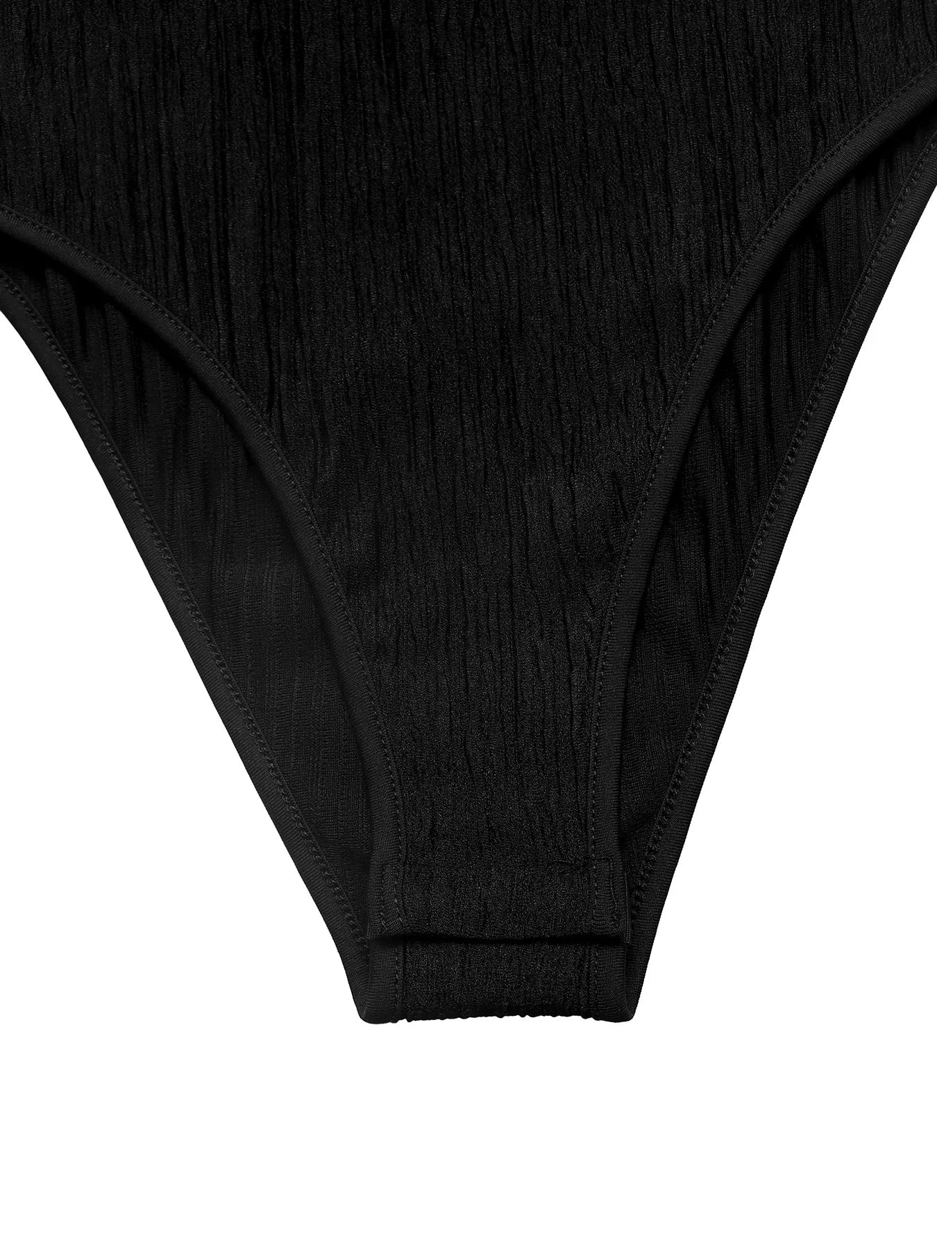 Close-up of black underwear on a white background