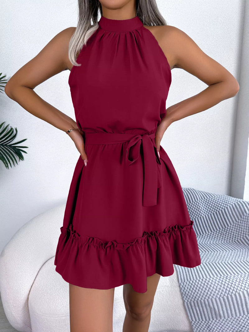 Red dress worn by a person with a white background