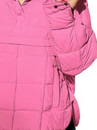 Close-up of a pink jacket with a focus on the chest area.