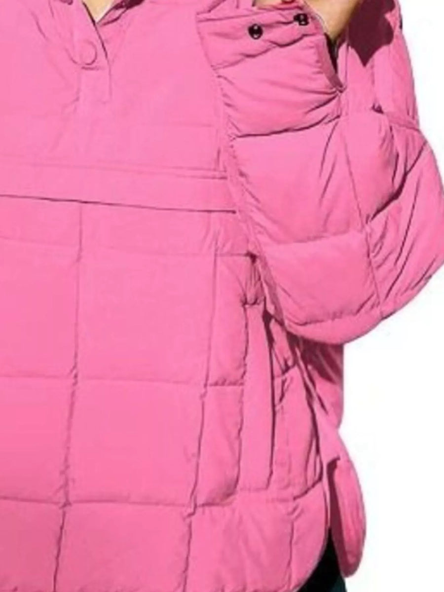 Close-up of a pink jacket with a focus on the chest area.