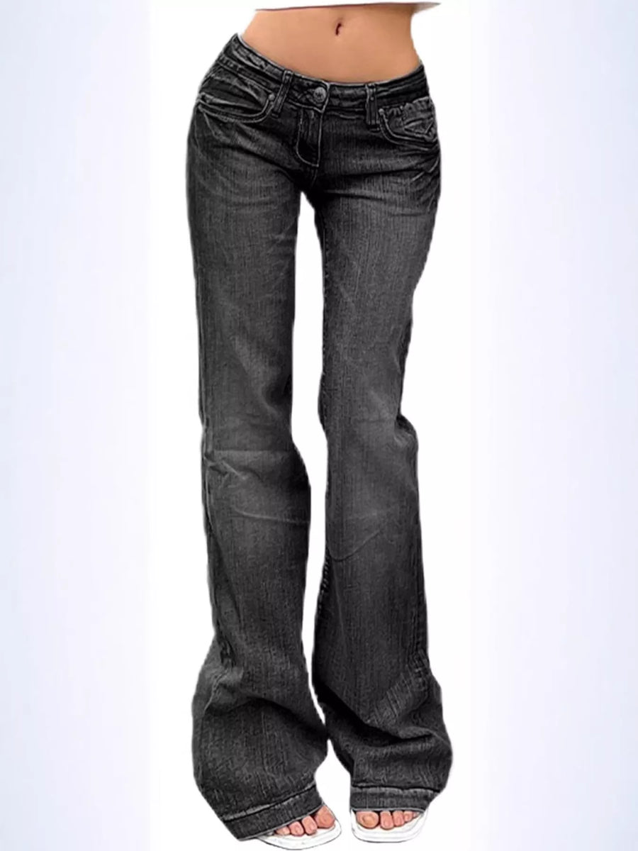 Black flared jeans on a white background