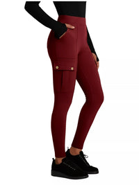 Maroon leggings with pockets worn by a person on a white background
