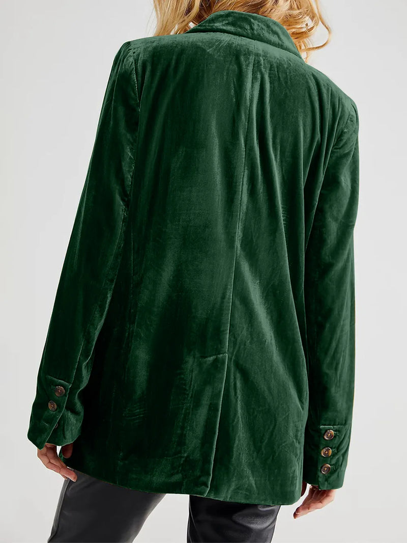 Green jacket worn by a person on a white background
