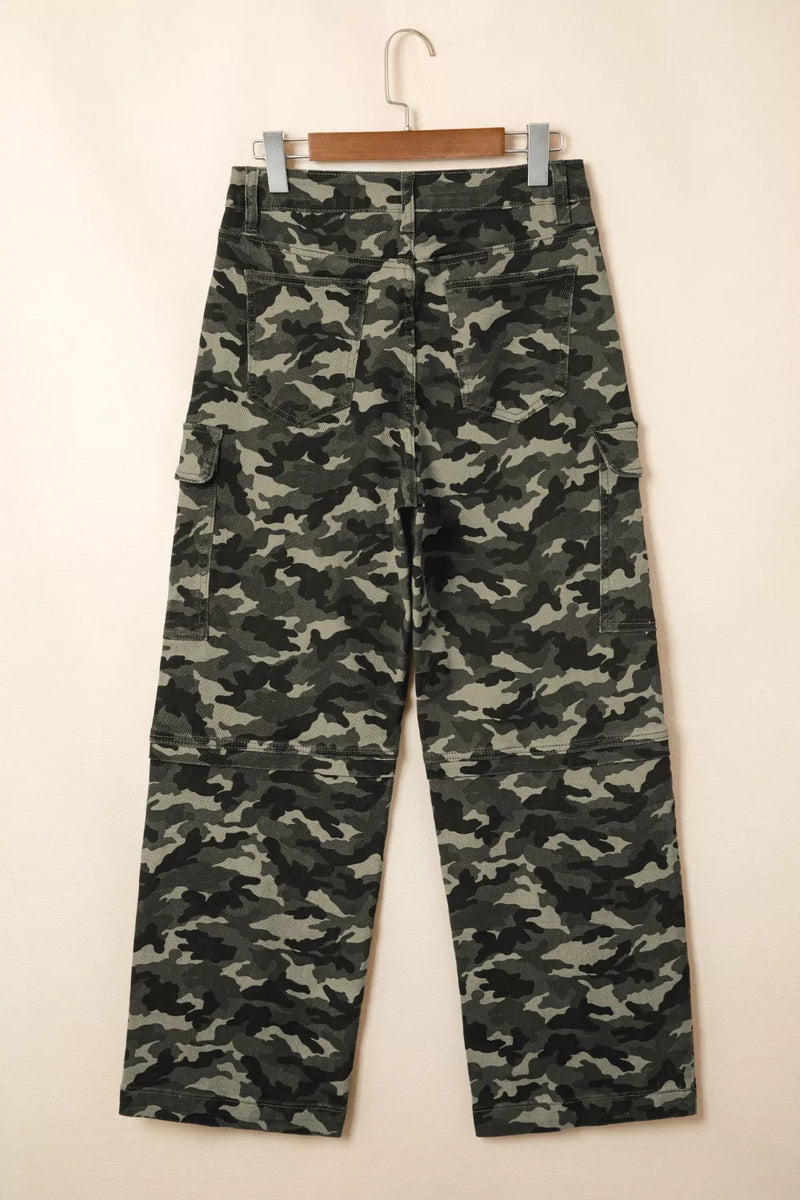 Camouflage pants on a hanger against a white background
