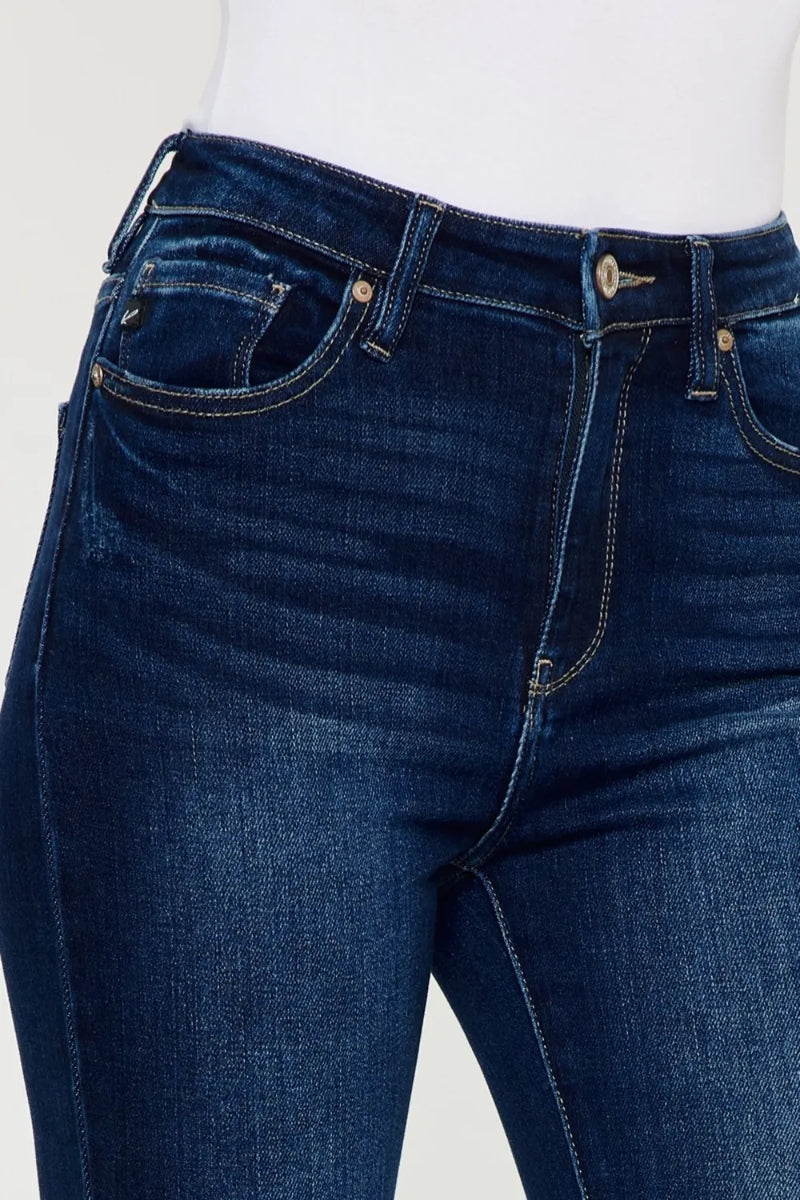Close-up of blue jeans on a white background