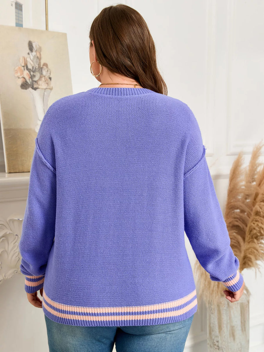Person wearing a blue sweater with a white background