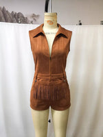Brown suede vest with fringe on a mannequin against a white background