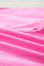 Close-up of pink fabric with soft texture