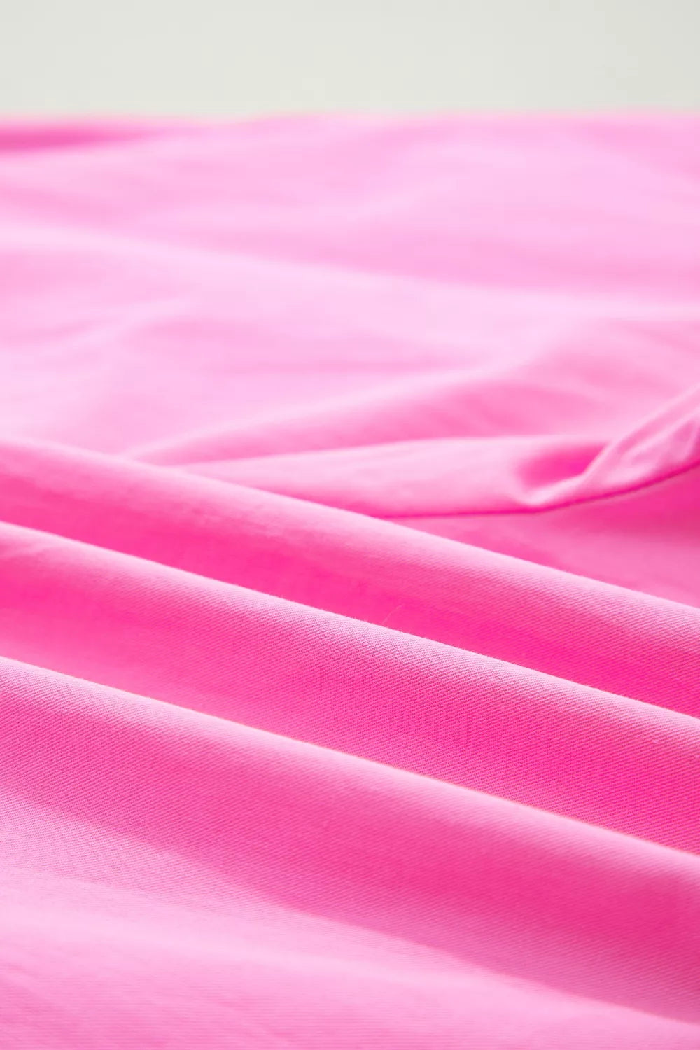 Close-up of pink fabric with soft texture