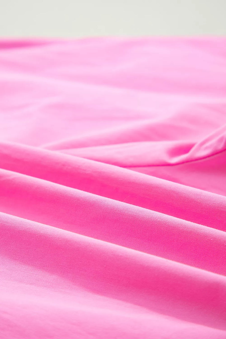 Close-up of pink fabric with soft texture