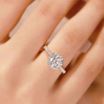 Silver ring with a large diamond on a hand