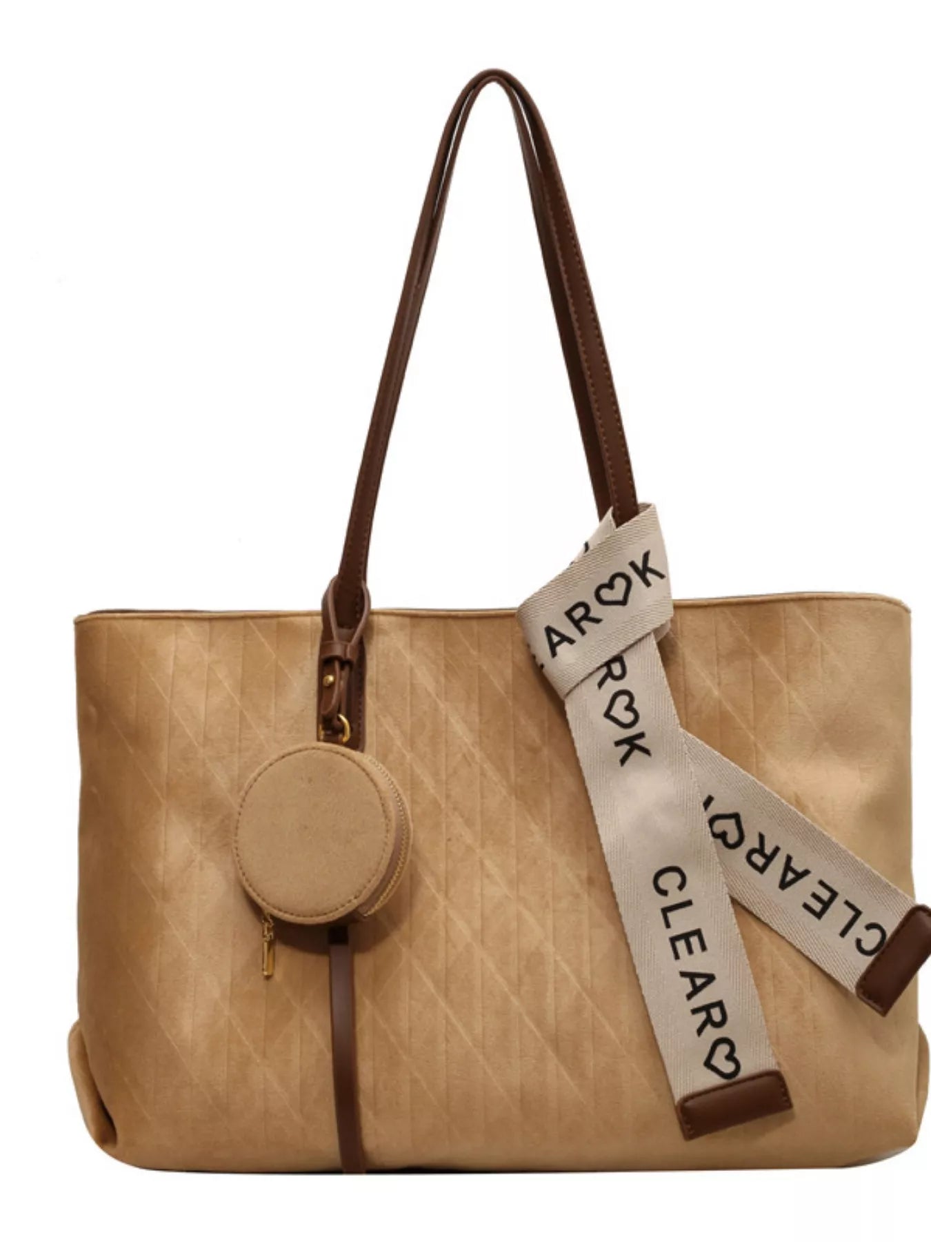 Beige handbag with a brown handle and decorative strap on a white background