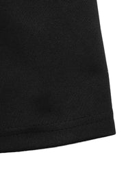 Close-up of a black fabric corner on a white background