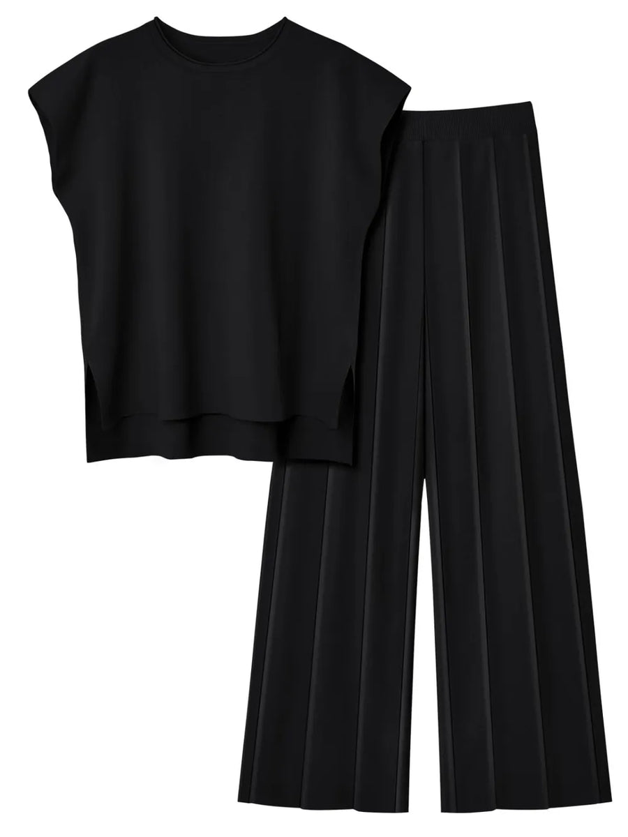 Black sleeveless top and wide-leg pants on a white background