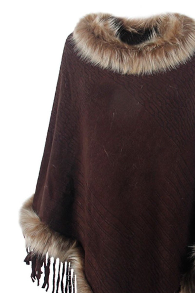 Brown poncho with fur trim on a white background