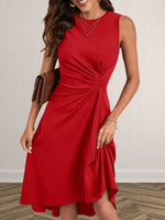 Woman wearing a red dress with a plain background