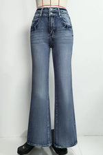 Blue flared jeans on a white background