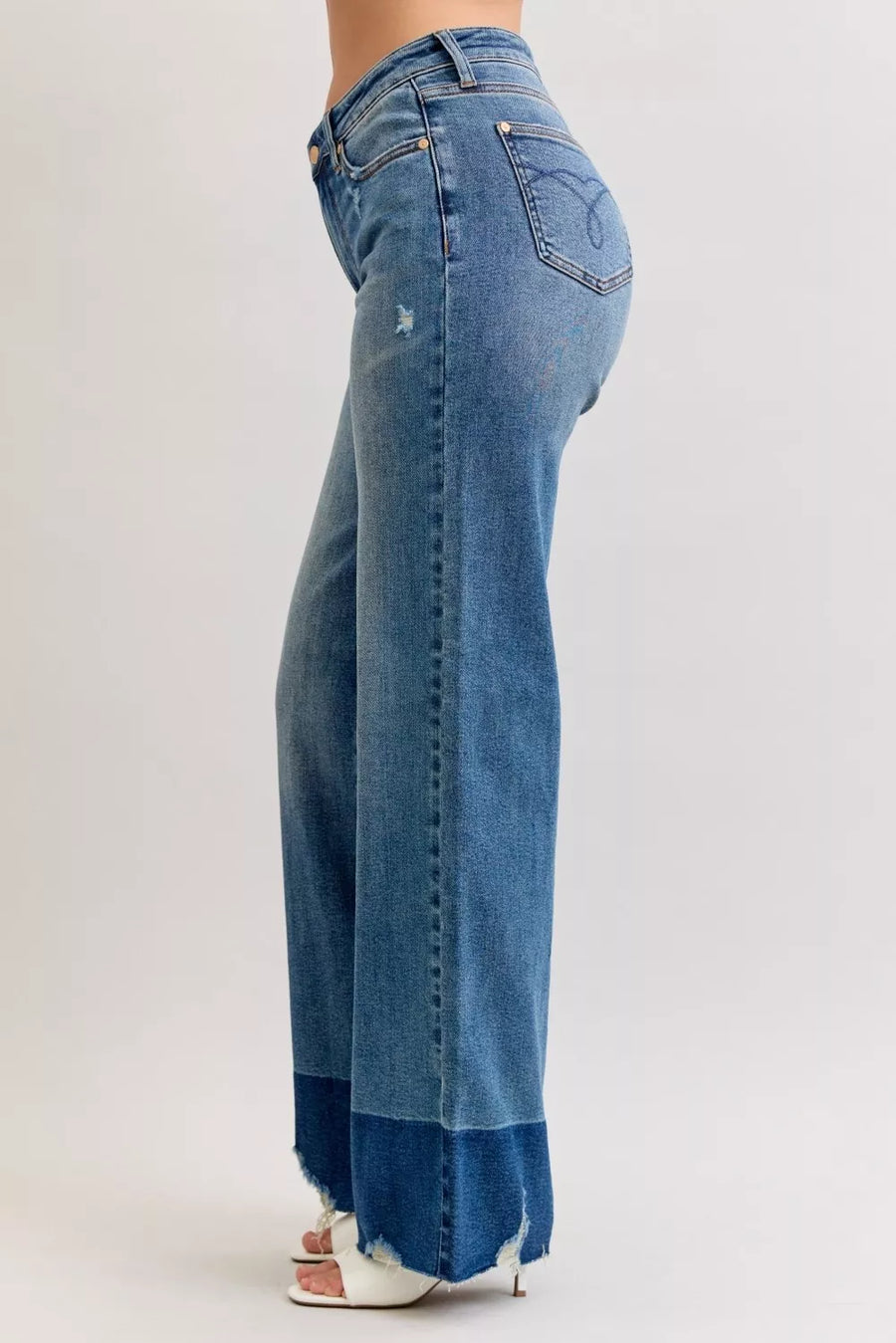 Blue jeans with a white background