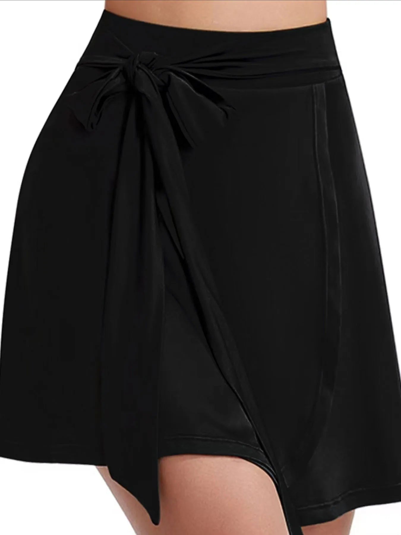 Black wrap skirt with a tie waist on a white background