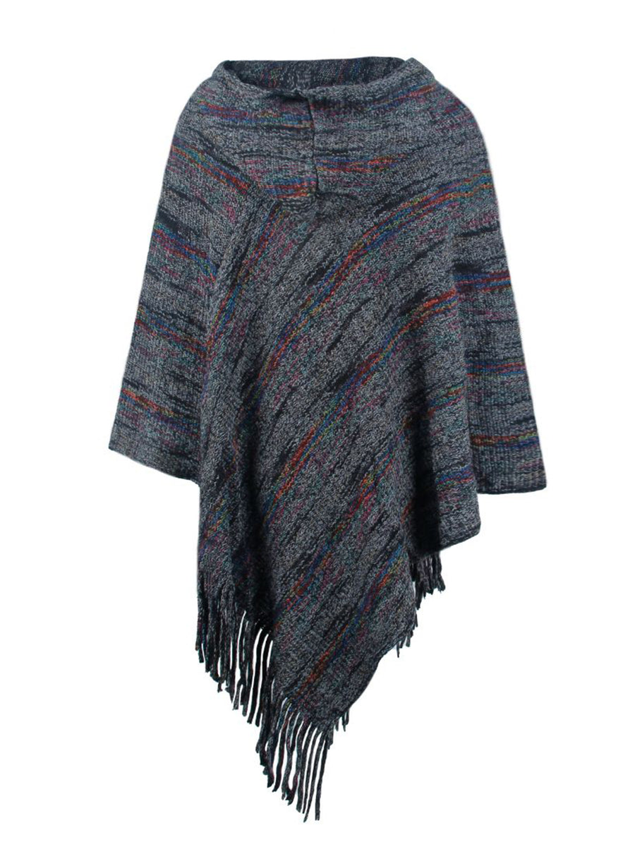 Textured poncho with fringes on a white background